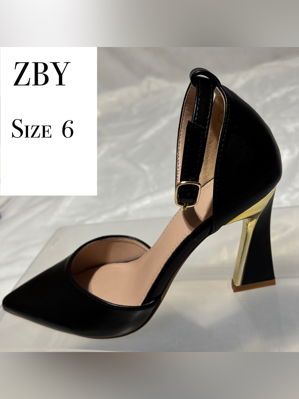 Women's Black Pointed-Toe Pump with ankle strap & gold accented 3-1/4” Heel